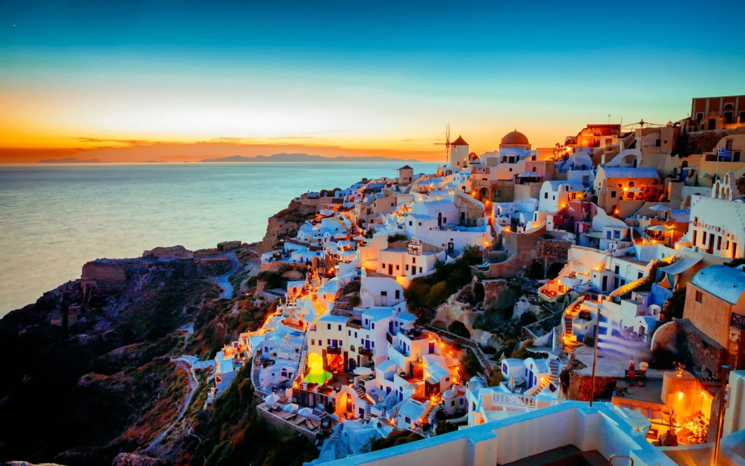 Last but, definitely, not least comes Santorini, an island renowned for its breathtaking sunset. Some claim that Santorini is ‘heaven on earth’ as the view from Oia combined with the whitewashed buildings, the traditional windmills, and the blue dome churches shape one of the most stunning views one can witness. At the same time, Santorini has an international airport (JTR) with flights to numerous European capitals to further facilitate you and ease your transportation.