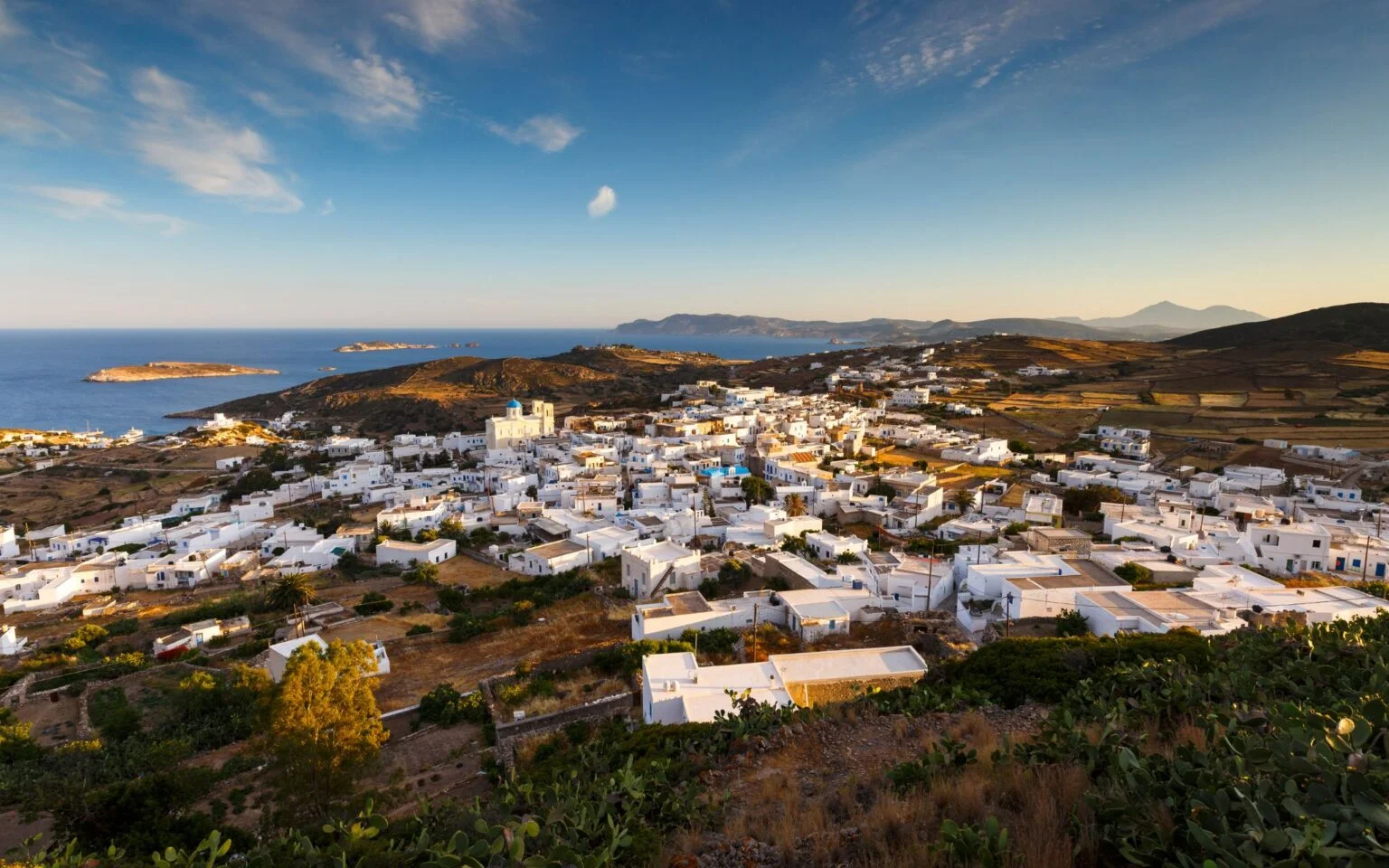 Right across Milos lies the magical Kimolos, a small and rocky island with a medieval and laid-back aesthetic. Once you get there, you should definitely visit Chorio as it is the one and only town of the island. Kimolos is also ideal for hiking lovers as there are many paths waiting to be discovered.